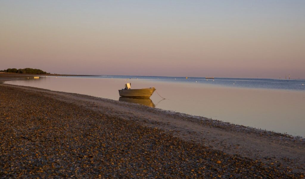 Boat on water by Lorrene McClymont