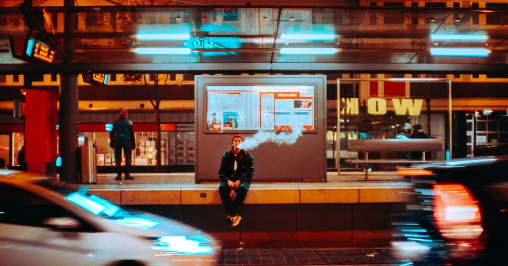 Young man vaping