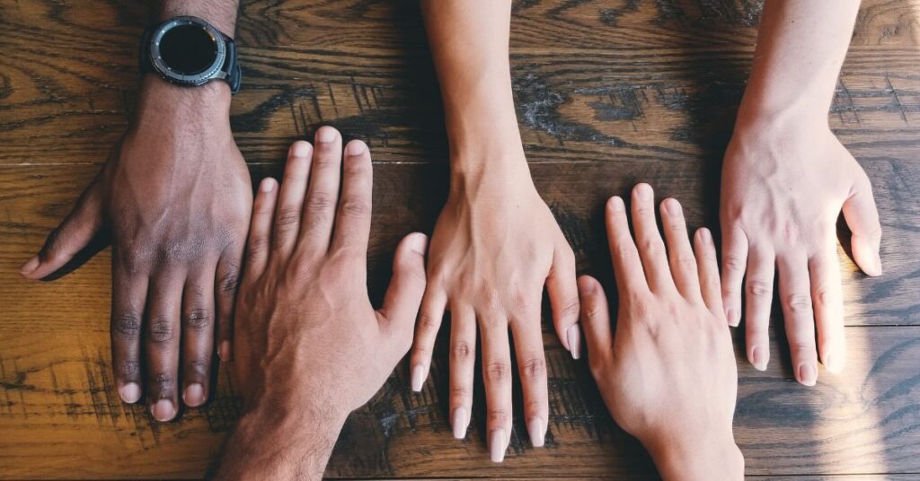 Hands on a table