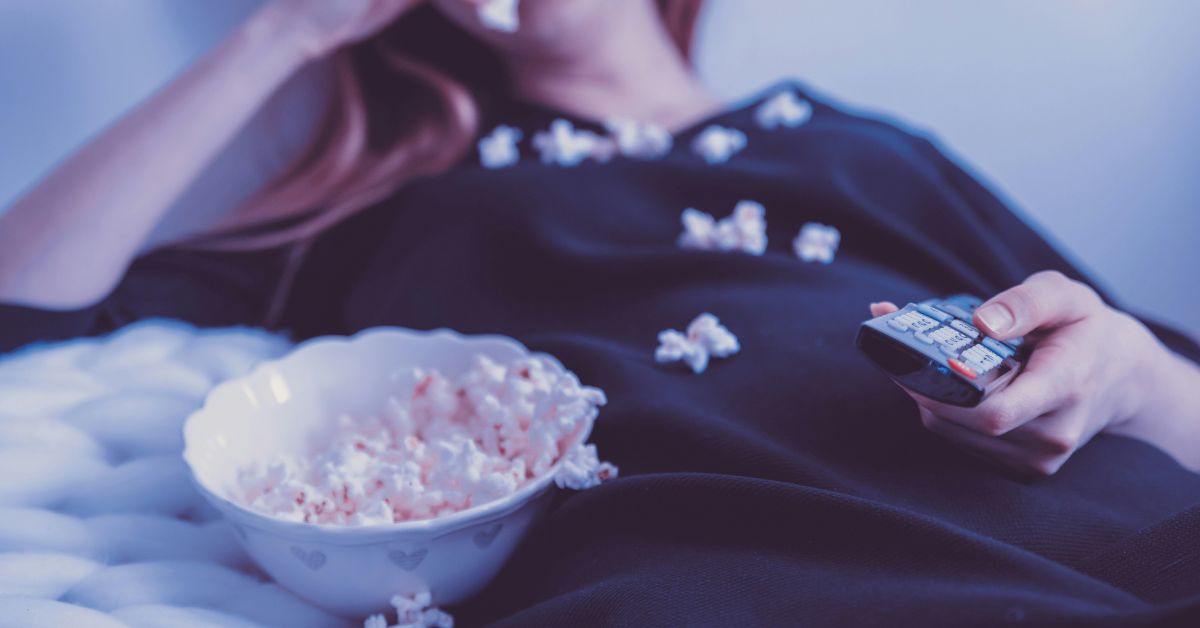 Woman-eating-popcorn-watching-movie-1.jpg